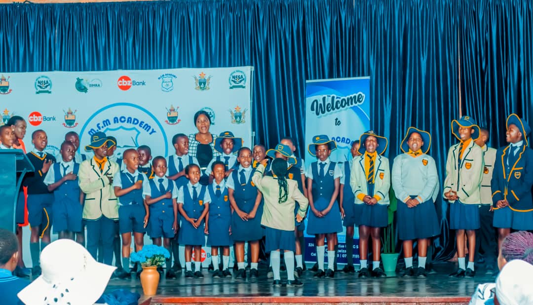 MFM Academy — Learners and staff together on stage
