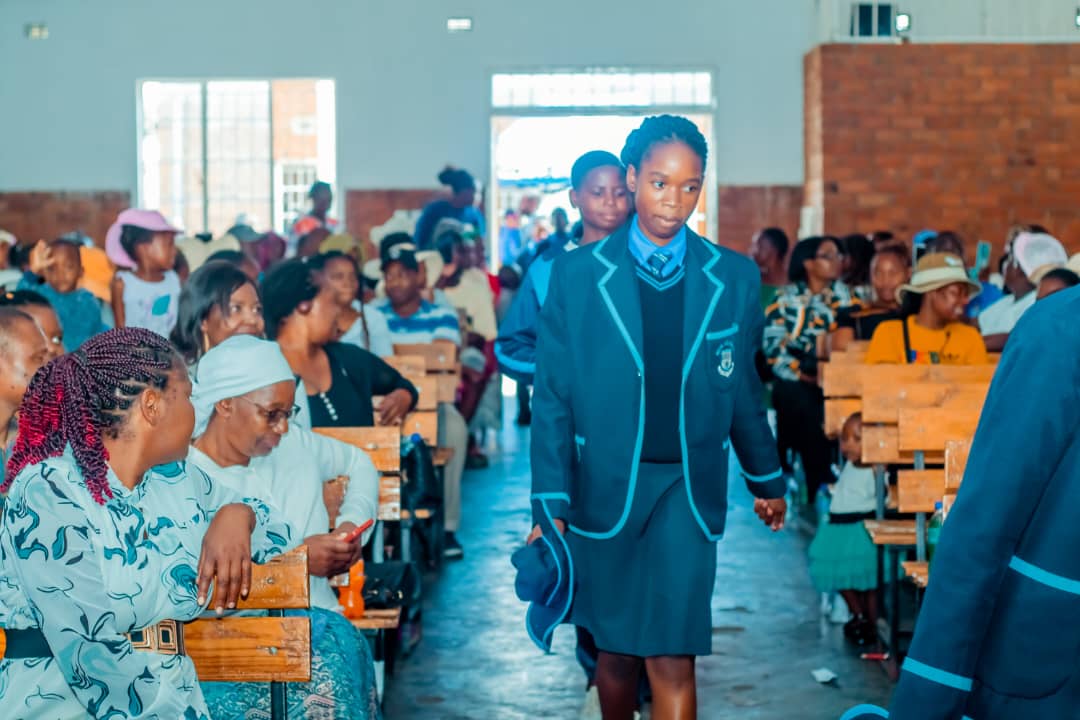 MFM Academy — Learners walking through the school hall