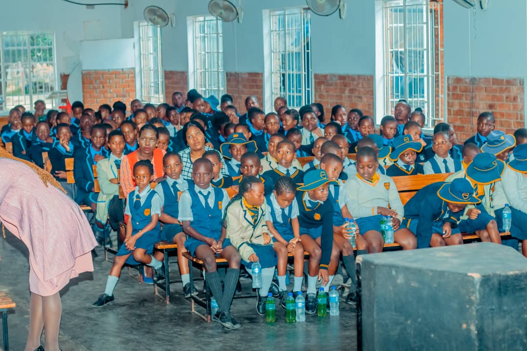 MFM Academy — Families and learners gathered in the hall