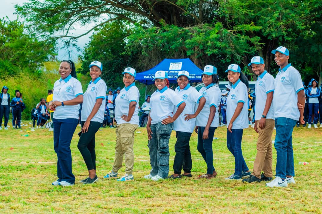 MFM Academy — Staff beside the school tent at sports day