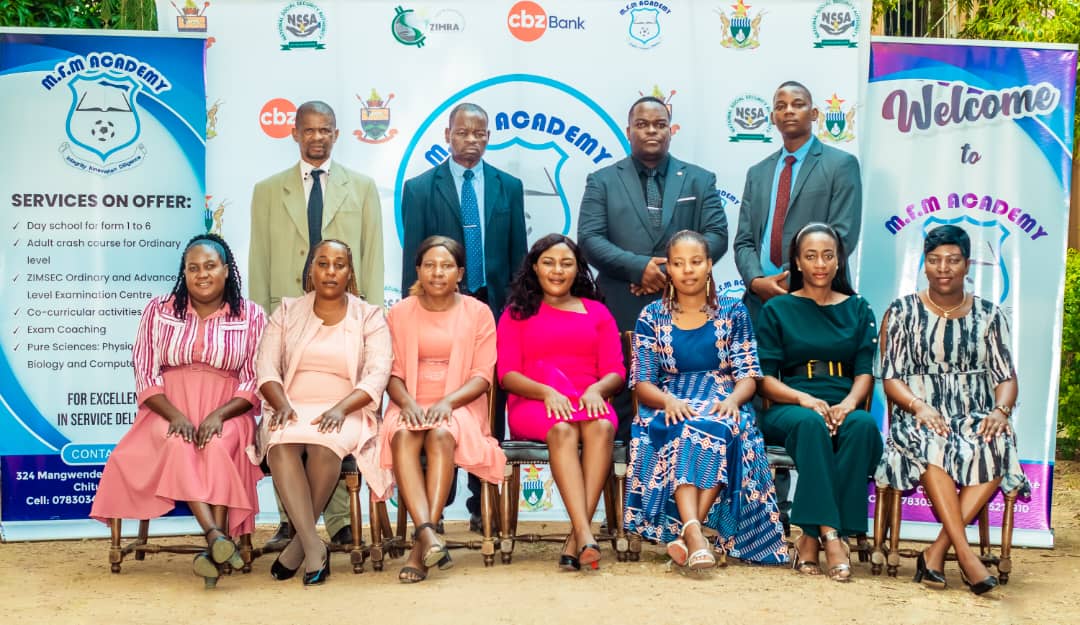 MFM Academy — Staff and guests posing at a school event