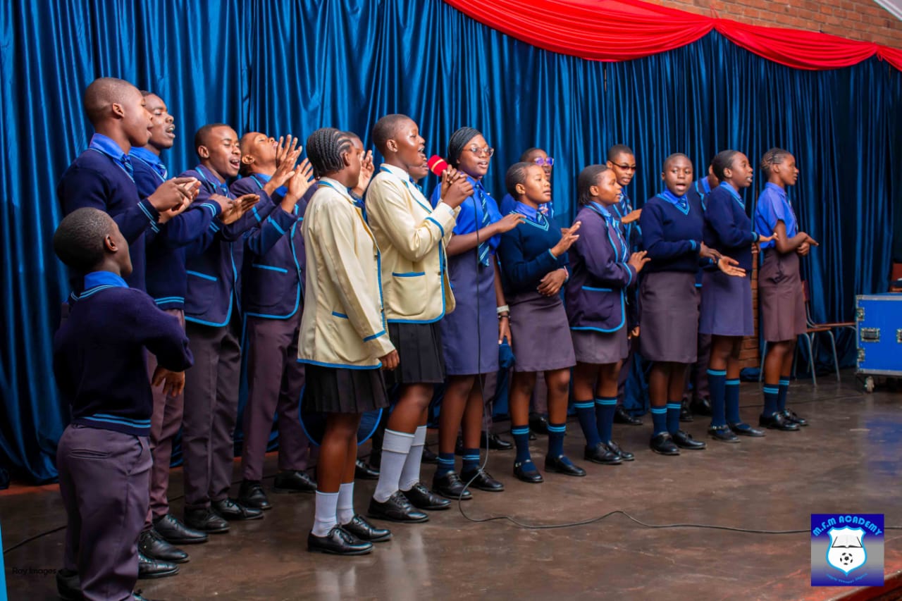 MFM Academy choir performing on stage